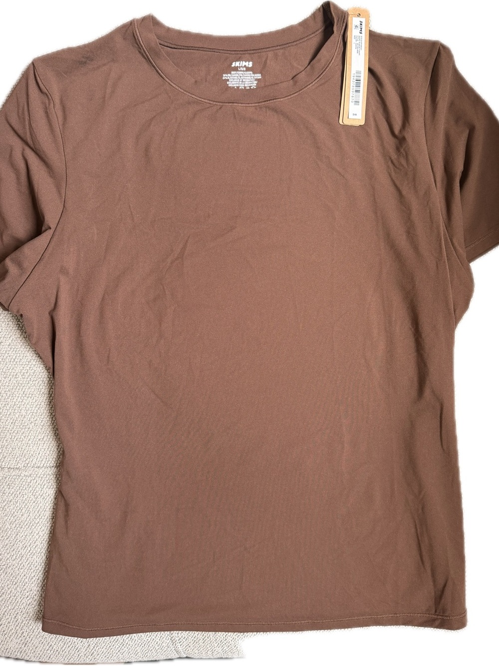SKIMS Fits Everyone Short Sleeve Crewneck Tee in Brown and Long Sleeve in Cream